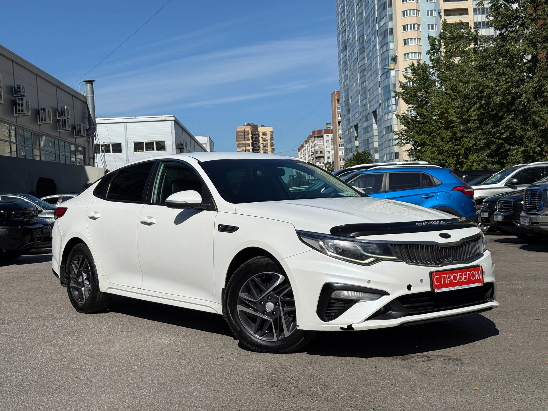 Kia OPTIMA XWE****14 с пробегом